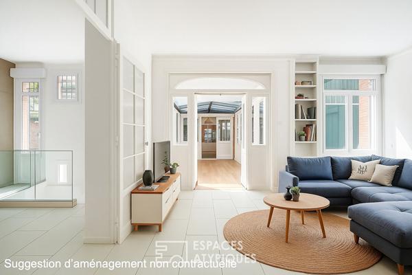 Rez-de jardin avec terrasses et véranda, rue de la Colonie