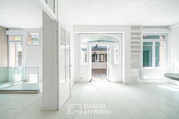 Rez-de jardin avec terrasses et véranda, rue de la Colonie