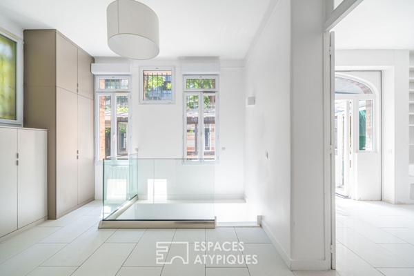 Rez-de jardin avec terrasses et véranda, rue de la Colonie