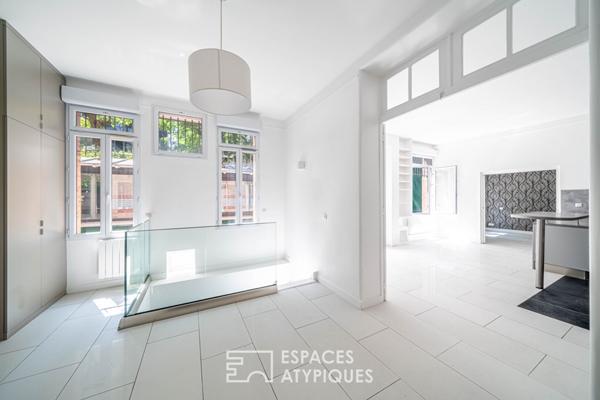 Rez-de jardin avec terrasses et véranda, rue de la Colonie