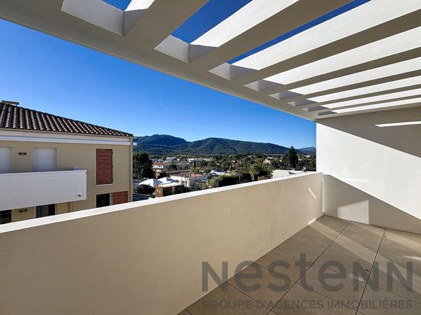 Appartement 3 pièce(s) 70m2 avec 2 balcons et place de parking sous-sol