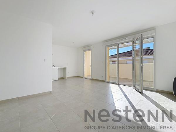 Appartement 3 pièce(s) 70m2 avec 2 balcons et place de parking sous-sol