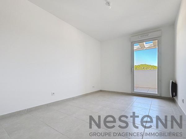 Appartement 3 pièce(s) 70m2 avec 2 balcons et place de parking sous-sol