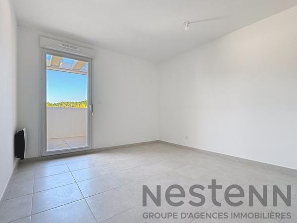 Appartement 3 pièce(s) 70m2 avec 2 balcons et place de parking sous-sol