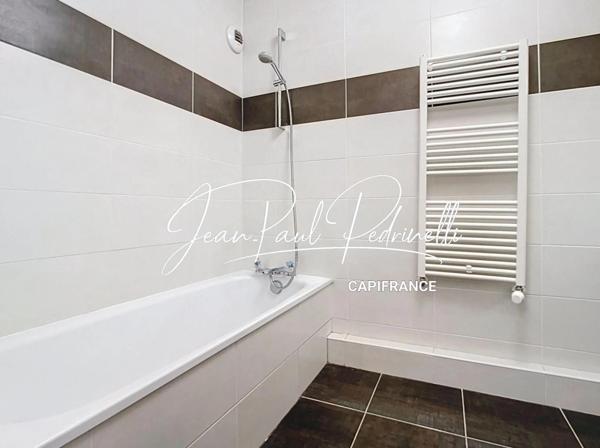 LYON 8 MERMOZ - T3 contemporain 64,5 m² – DPE B – Grand balcon 9 m² – Garage en supplément – Métro D – Tram T6 – Bus C15 & PL1