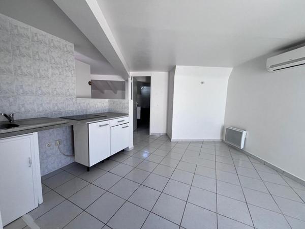 Charmant appartement de type loft au dernier étage d'une résidence de standing avec petite terrasse