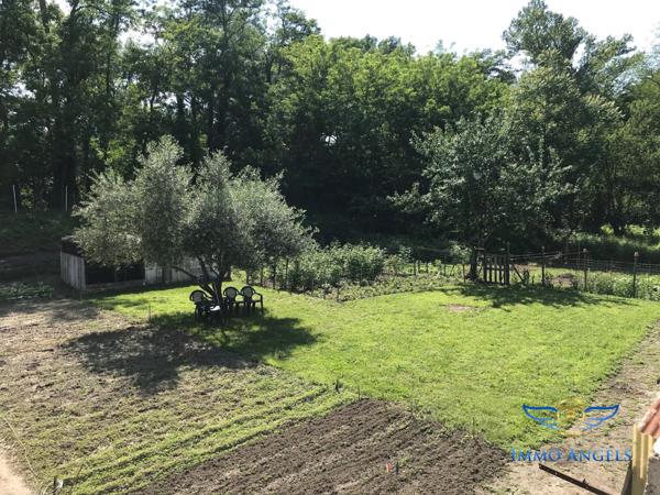 Saint Ambroix, immeuble de 3 appartements, atelier, caves et terrain 2500m²