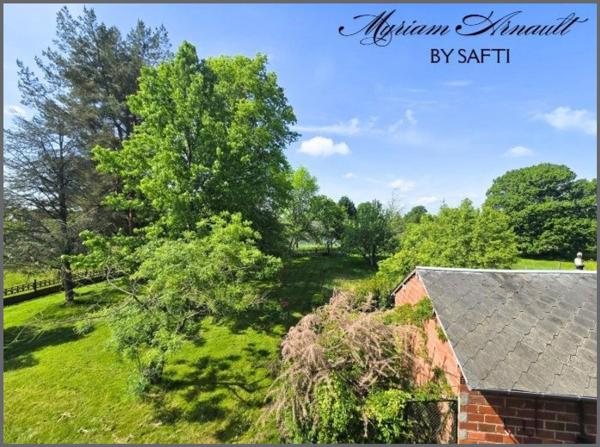 Propriété 240 m² divisée en 3 appartements avec garage et dépendances sur terrain