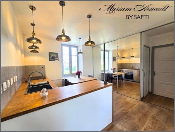 Propriété 240 m² divisée en 3 appartements avec garage et dépendances sur terrain