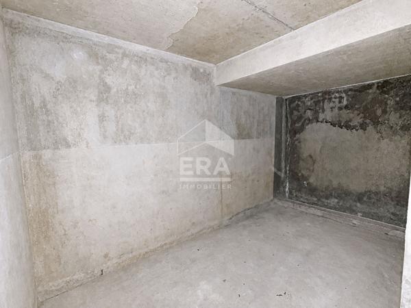 Appartement 3 pièces avec jardin privatif, double garage et cave