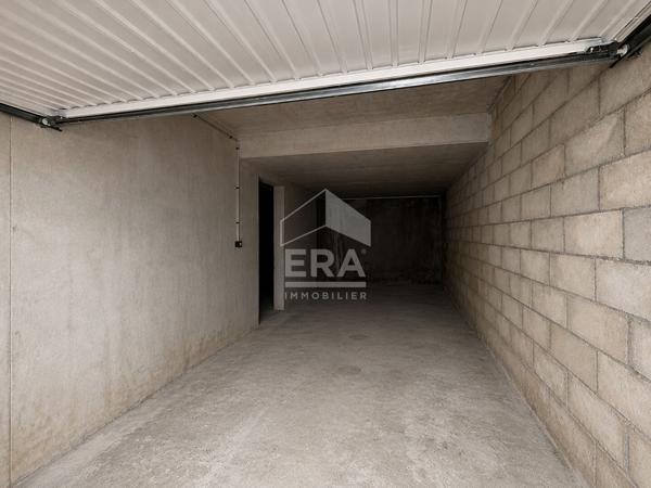 Appartement 3 pièces avec jardin privatif, double garage et cave