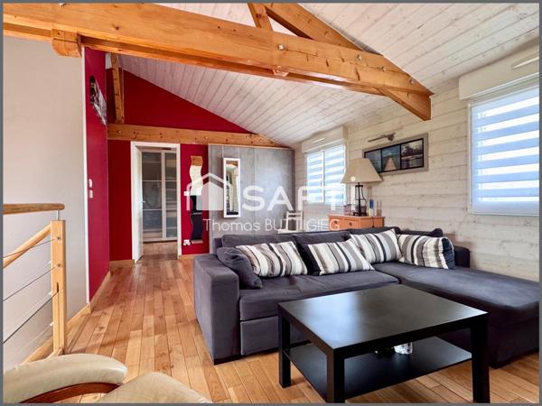 Maison spacieuse de 5 chambres, garage et jardin.