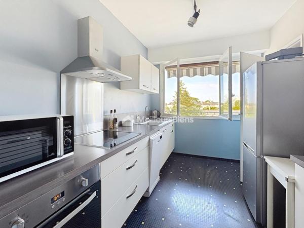 Elégant appartement baigné de lumière dans une résidence prisée d'Angers