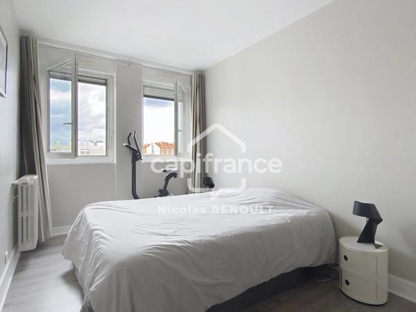 Appartement spacieux avec cave & parking