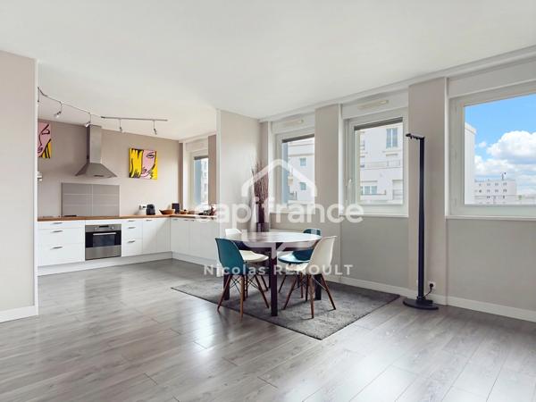 Appartement spacieux avec cave & parking