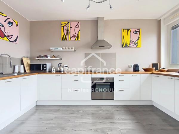 Appartement spacieux avec cave & parking