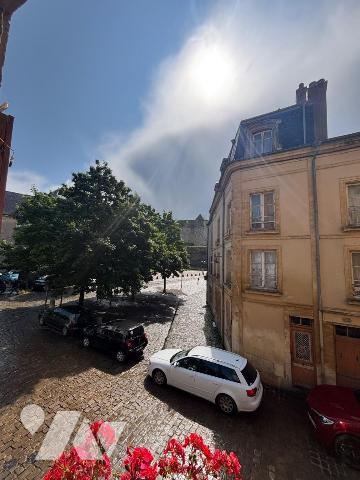 Au pied du château fort de Sedan, murs et fond de commerce d' une institution située dans les A...
