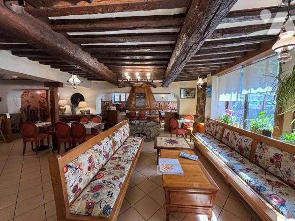 Au pied du château fort de Sedan, murs et fond de commerce d' une institution située dans les A...