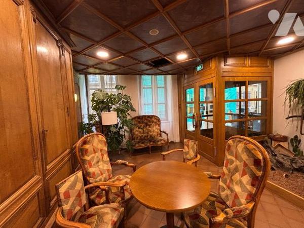 Au pied du château fort de Sedan, murs et fond de commerce d' une institution située dans les A...