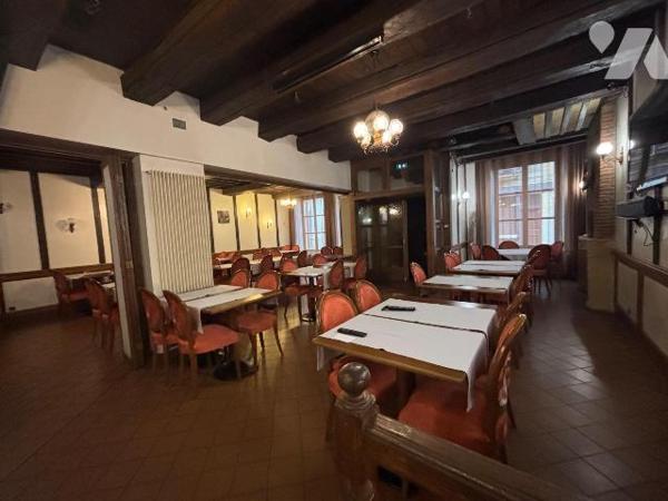 Au pied du château fort de Sedan, murs et fond de commerce d' une institution située dans les A...