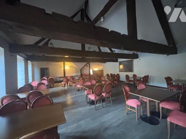 Au pied du château fort de Sedan, murs et fond de commerce d' une institution située dans les A...