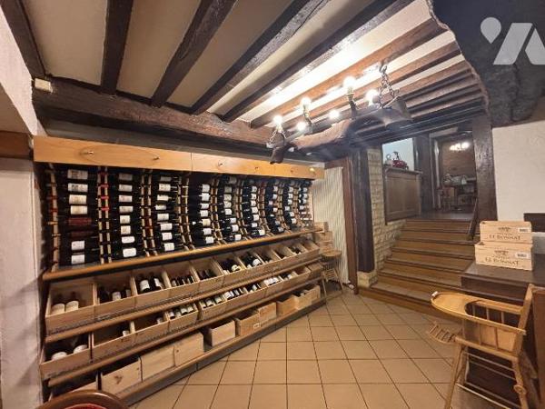 Au pied du château fort de Sedan, murs et fond de commerce d' une institution située dans les A...