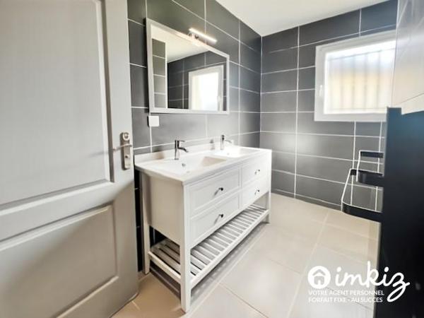 Maison 6 pièces de 119m² rénovée avec jardin.