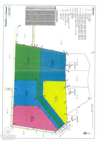 Terrain situé proche de la gare de LISON, parcelle de  9 941 m2 divisé en 5 lots.
prix : 30 € le m2.