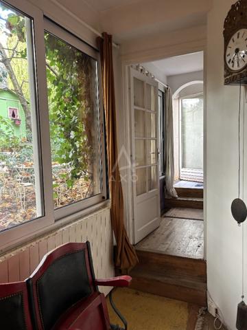 Appartement 194 m² avec jardin privatif  Idéal habitation ou activité professionnelle.