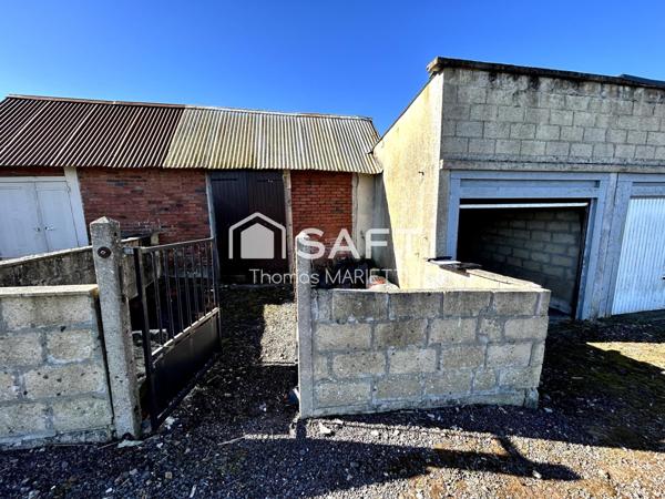 Garage avec cave, remise et terrasse