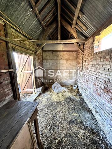 Garage avec cave, remise et terrasse