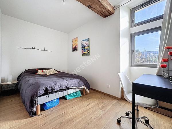 Maison en pierres à vendre à Ancenis-Saint-Géréon - Centre historique : 4 chambres, cour intérieur, rénovation de qualité.