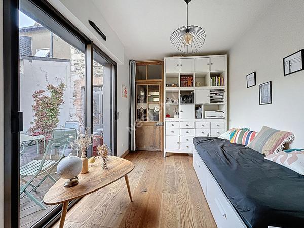 Maison en pierres à vendre à Ancenis-Saint-Géréon - Centre historique : 4 chambres, cour intérieur, rénovation de qualité.