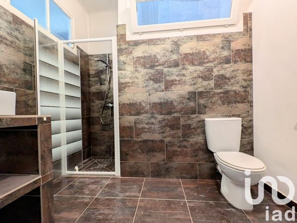 Appartement 4 pièces de 91 m² à Estagel (66310)