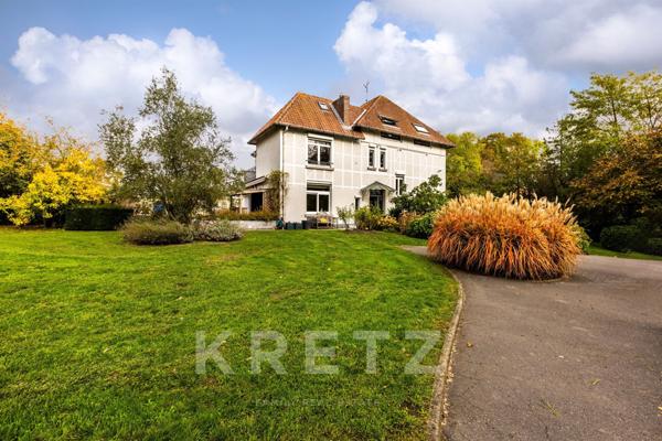 Demeure anglo-normande au coeur d'un parc arboré