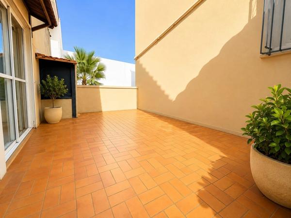 Appartement T2 85 m² avec terrasse Champ de Mars Béziers charme de l'ancien