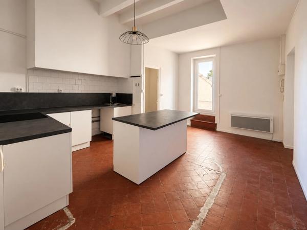 Appartement T2 85 m² avec terrasse Champ de Mars Béziers charme de l'ancien