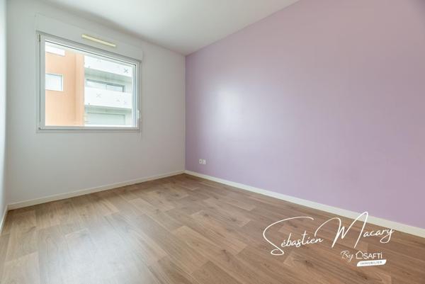 Appartement 3 pièces de 64 m² avec balcon et parking