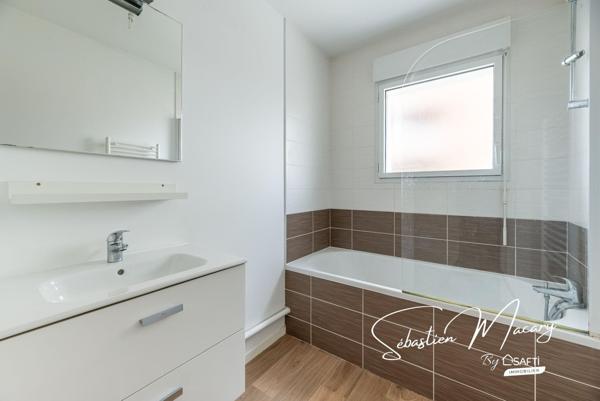 Appartement 3 pièces de 64 m² avec balcon et parking