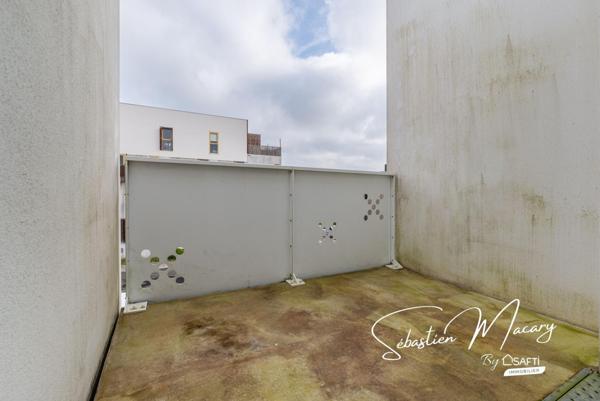 Appartement 3 pièces de 64 m² avec balcon et parking