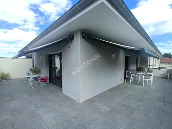 Superbe appartement de type 4 avec terrasse, stationnement et garage!