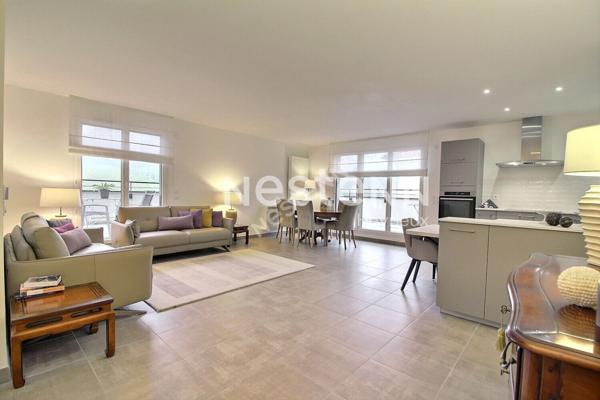 Superbe appartement de type 4 avec terrasse, stationnement et garage!