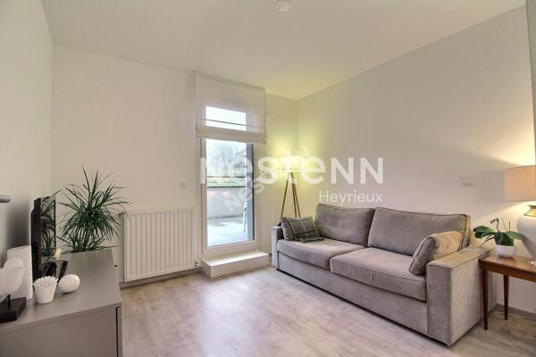 Superbe appartement de type 4 avec terrasse, stationnement et garage!