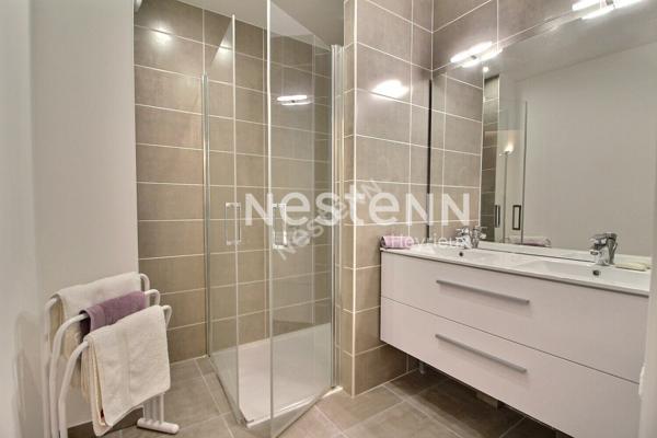 Superbe appartement de type 4 avec terrasse, stationnement et garage!