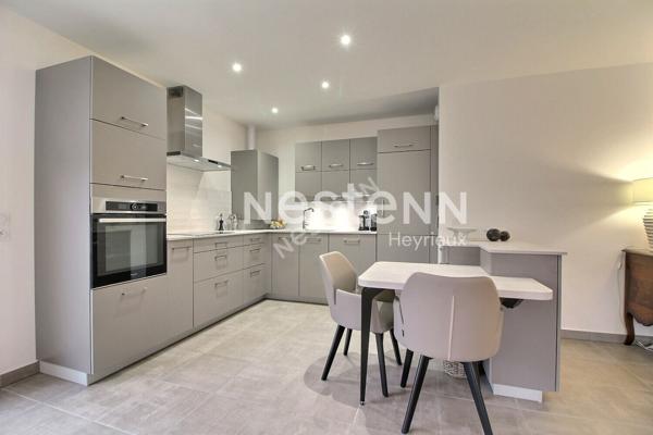 Superbe appartement de type 4 avec terrasse, stationnement et garage!