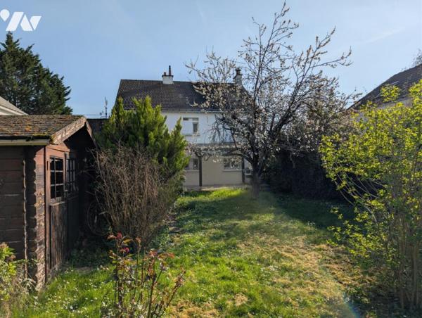 Maison 2 niveau - Garage - Terrain 