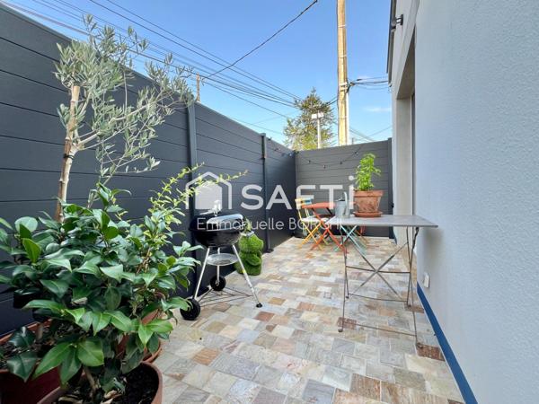 Maison 1 chambre, terrasse, jardinet, stationnement privatif, local.