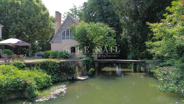 Maison familiale avec moulin à eau en bord de rivière et 6 îles