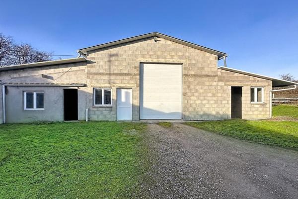 Maison de plain-pied avec grand dépôt à Neufchâteau