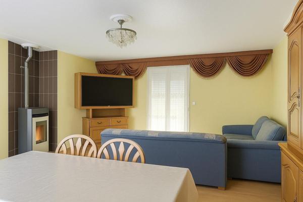 Maison de plain-pied avec grand dépôt à Neufchâteau